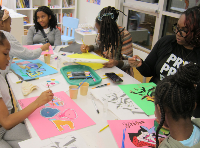 Hands-on with Graffiti painting workshop participants
